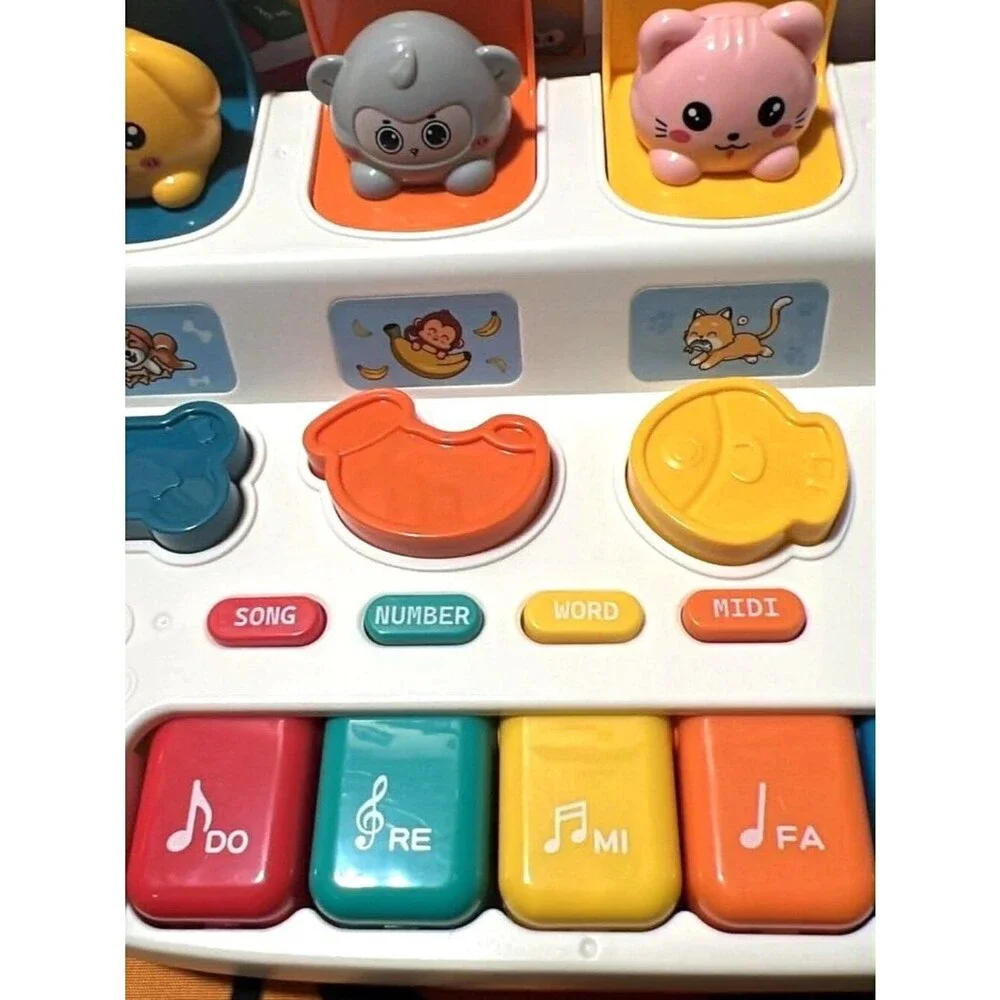 Interactive Pop‑Up Animal Musical Toy – Lights, Music, Piano Keys – Ages 3+